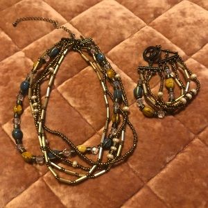 Multi strand beaded necklace and matching bracelet.